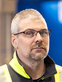 Anders_Karlsson_Centramec Profilbild von Anders Karlsson in einer Warnschutzjacke.